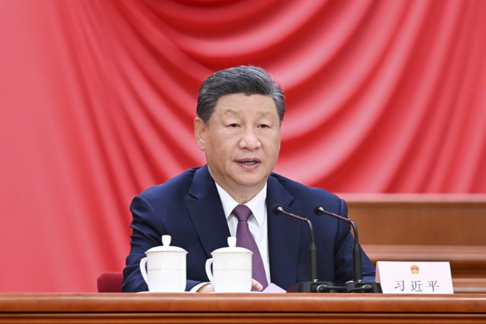 9月14日上午，中共中央、全國人大常委會(huì)在北京人民大會(huì)堂隆重舉行慶祝全國人民代表大會(huì)成立70周年大會(huì)。中共中央總書記、國家主席、中央軍委主席習(xí)近平出席會(huì)議并發(fā)表重要講話。 新華社記者 謝環(huán)馳 攝
